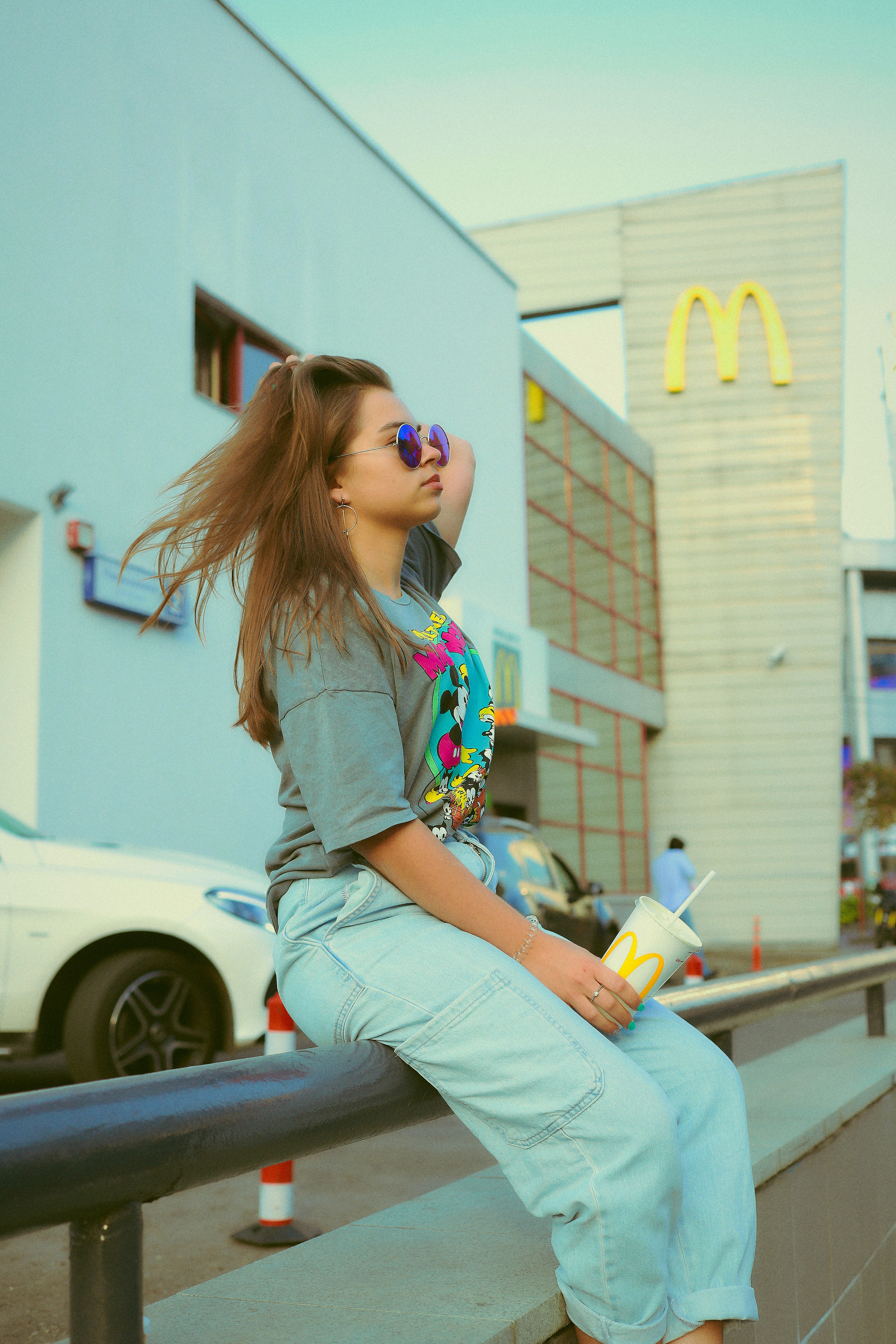 shallow focus photo of woman in gray T-shirt